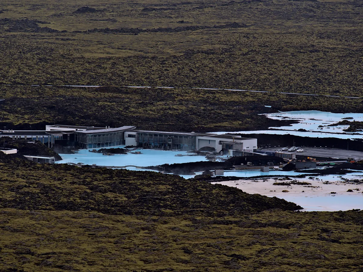 The Blue Lagoon Resort nestled in the volcanic landscape, surrounded by pools of steaming geothermal water