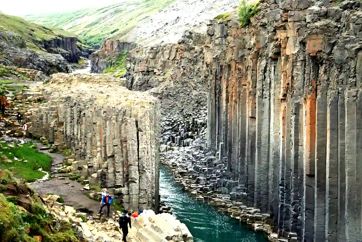 A breathtaking view of Studlagil Canyon’s basalt column formations in East Iceland.