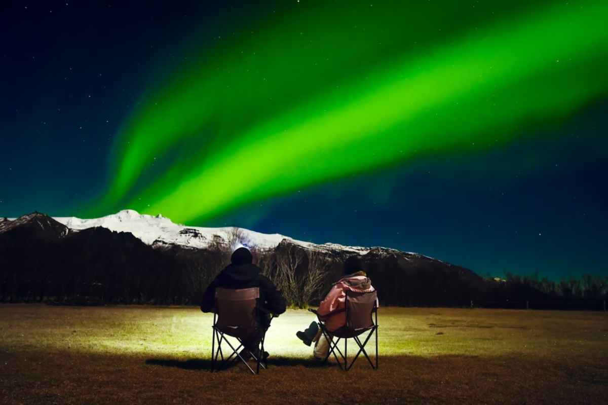 Campers enjoying the northern lights 