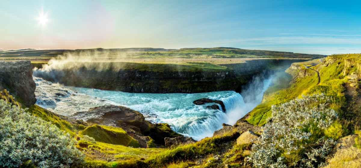 Iceland's Gullfoss waterfall in panoramic view during a beautiful sunny, spring day.