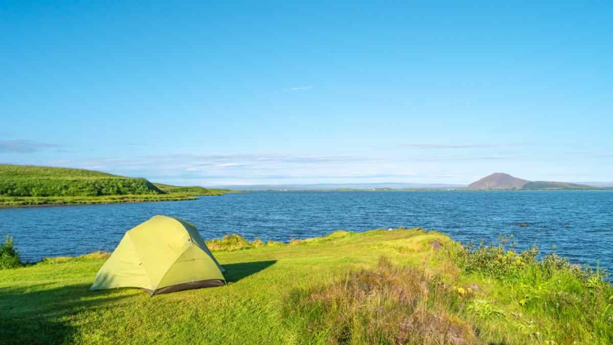 Camping tent by Lake myvatn