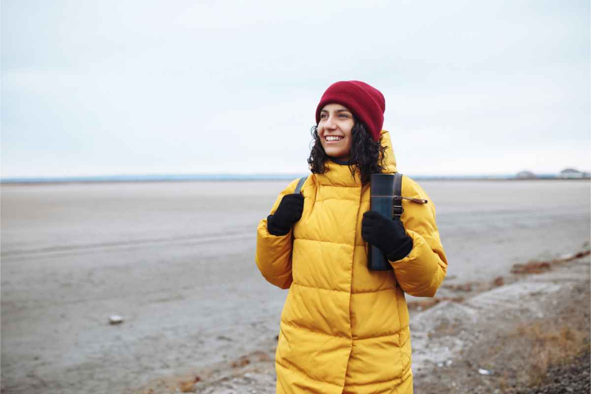 Tourist wearing a bright yellow waterproof jacket