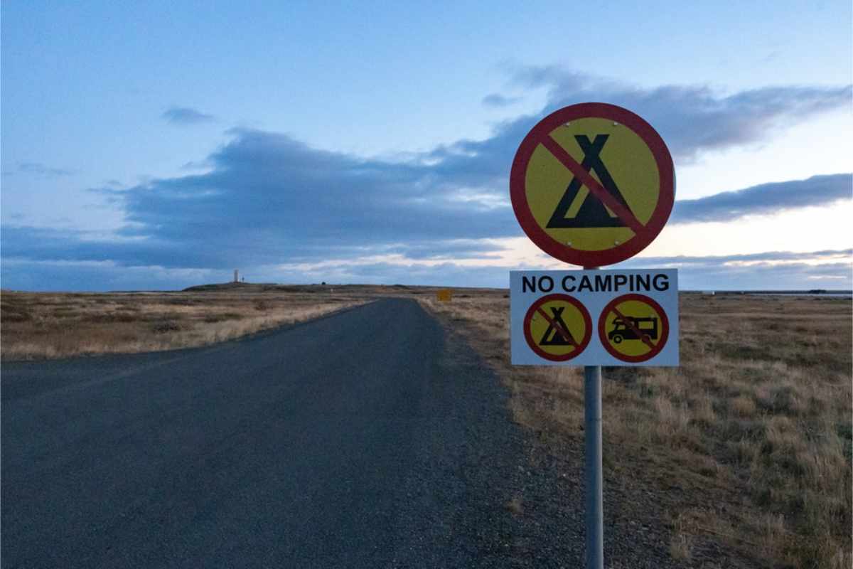 Road signs stating that camping is forbidden in the area