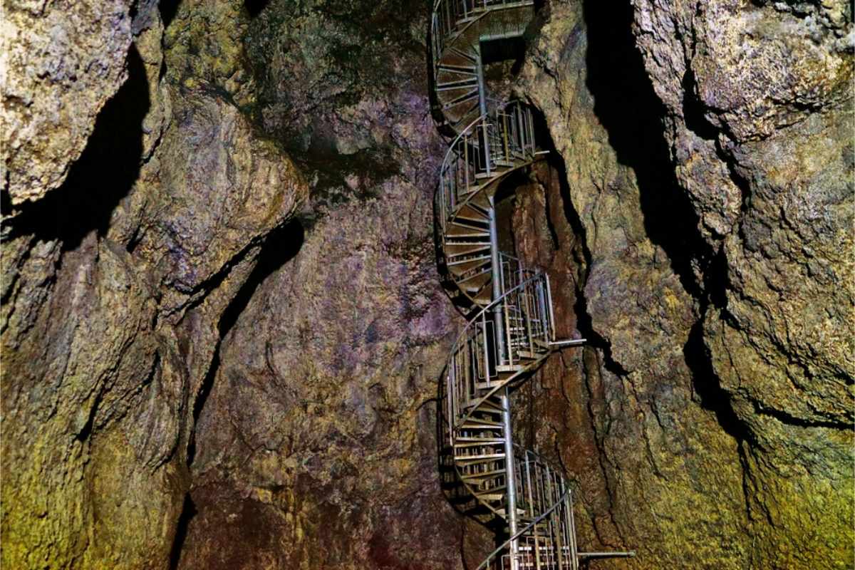 Vatnshellir cave interior with a metal stair in the middle