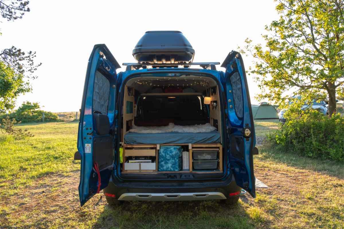 Rear view of a campervan with its doors wide open