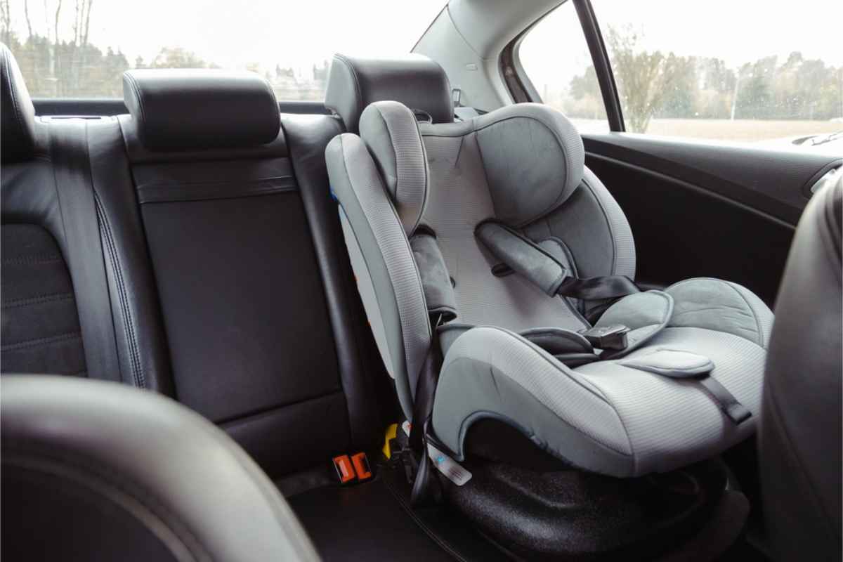 Grey retention seat installed in a car