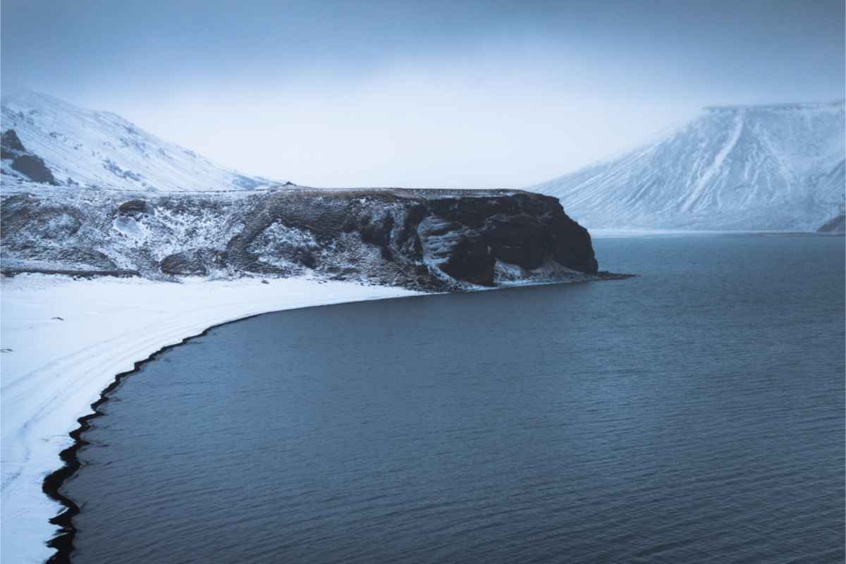 Kleifarvatn lake with its shore covered in snow