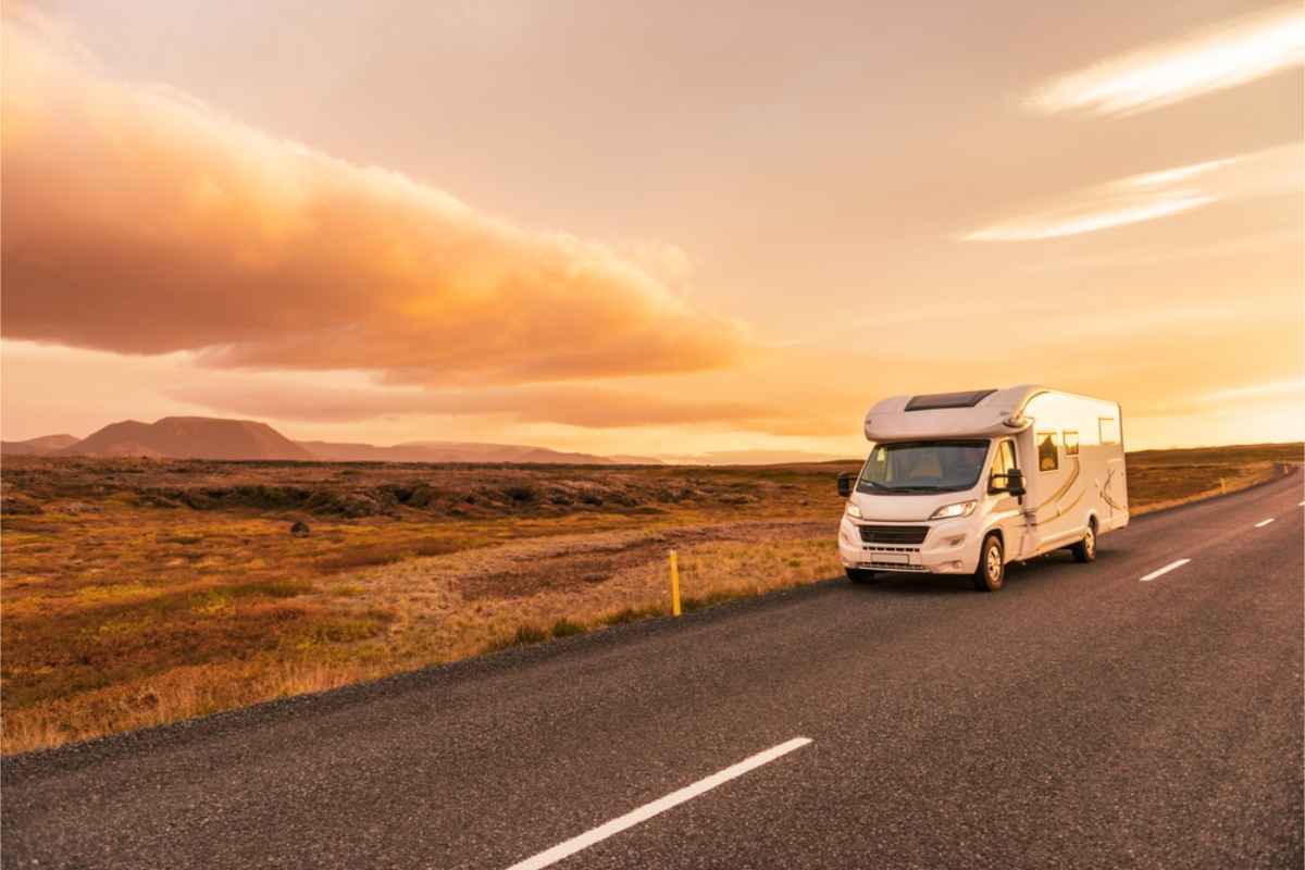 White large motorhome on Iceland´s ring road at dusk