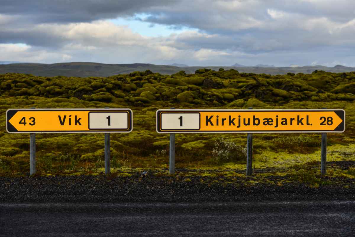 Road signs showing the way to Vik and Kirkjubaejarkl.