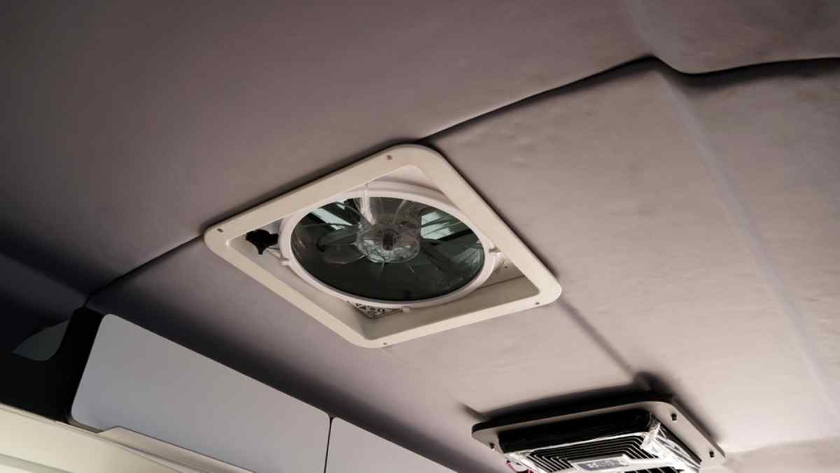 RV ceiling fan and vent providing safe ventilation for indoor cooking.
