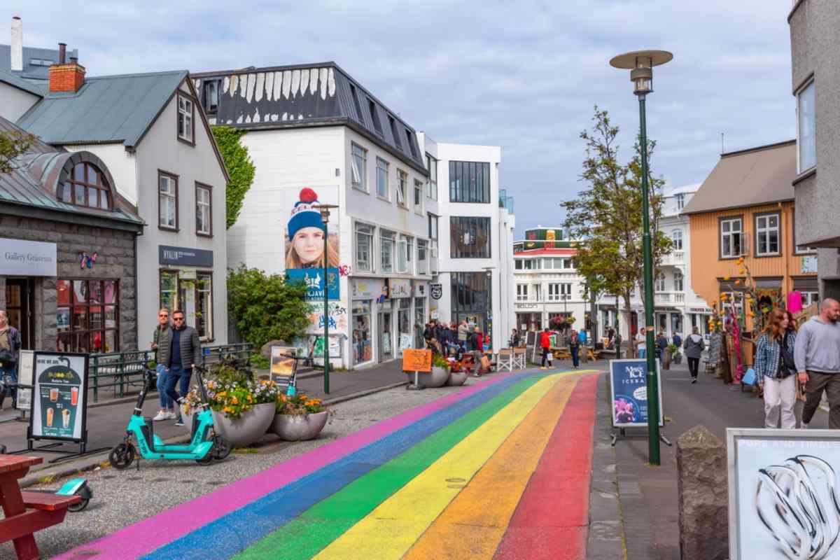 The importance of creating a trip itinerary through Reykjavik Rainbow street in Reykjavík’s center lined with shops.