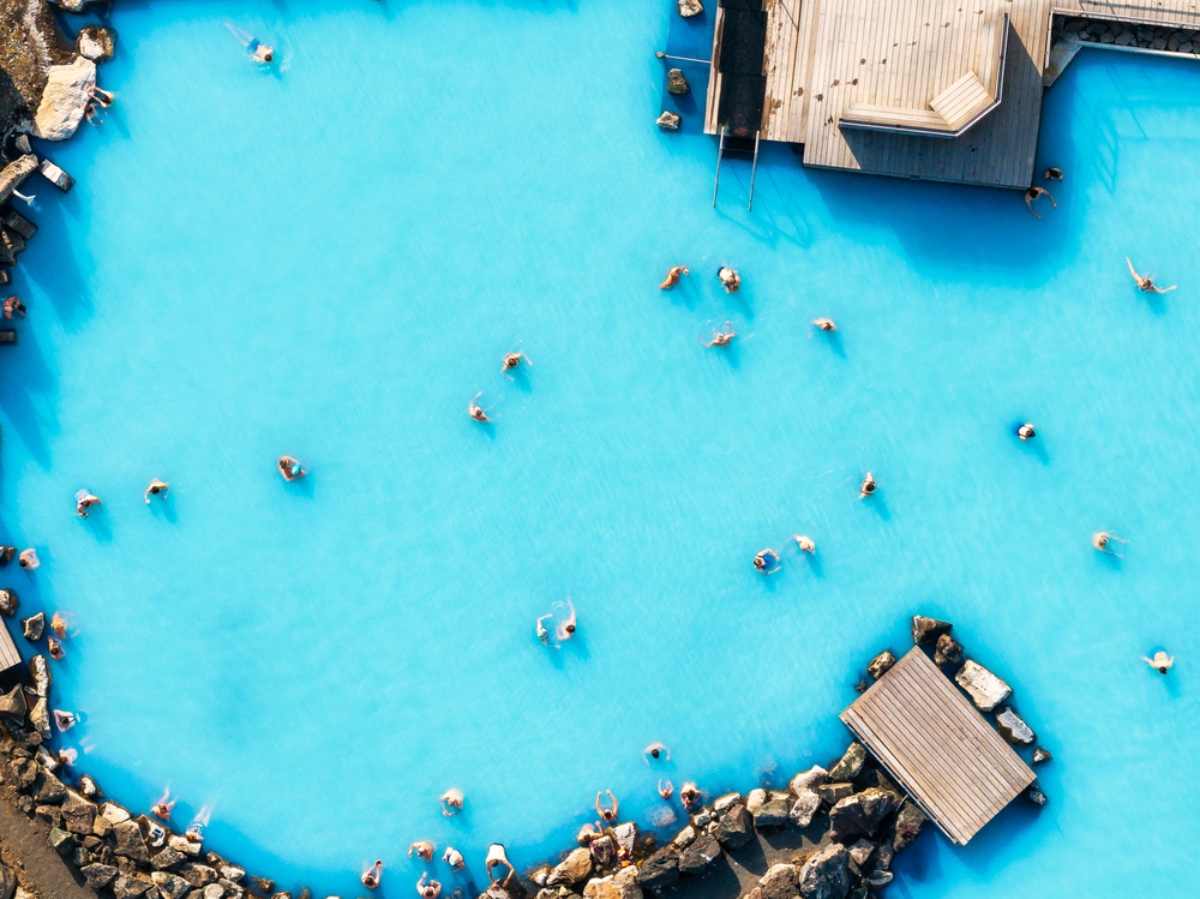 Aerial views of the Blue Lagoon of Iceland with intense turquoise waters