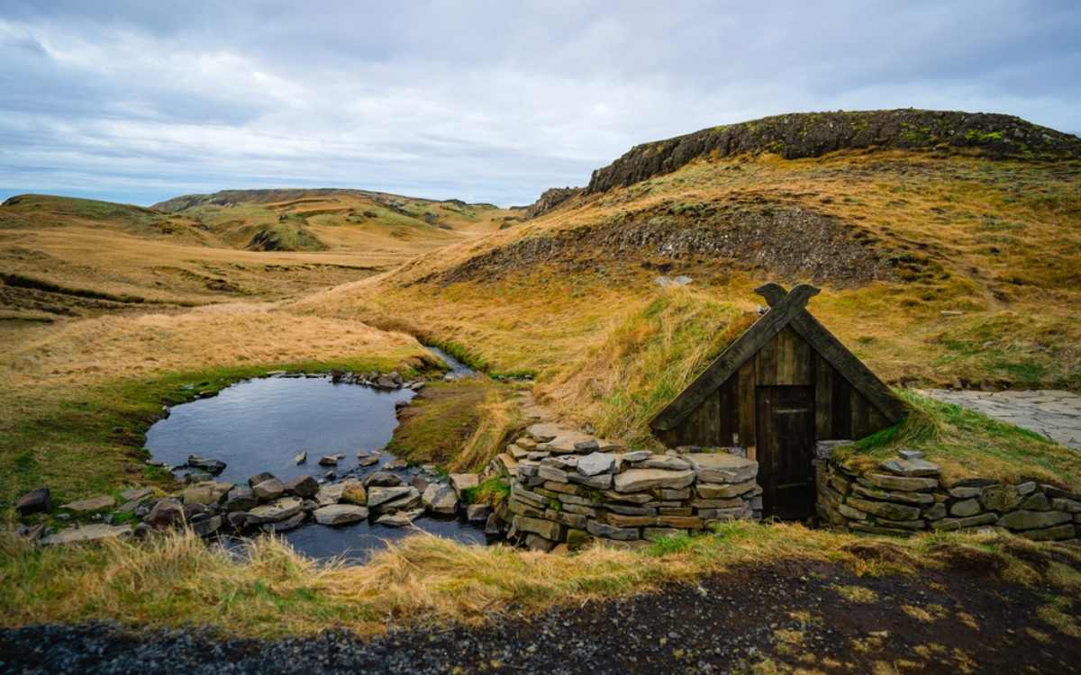 Hurnalaug hot spring in Iceland with viking like architecture