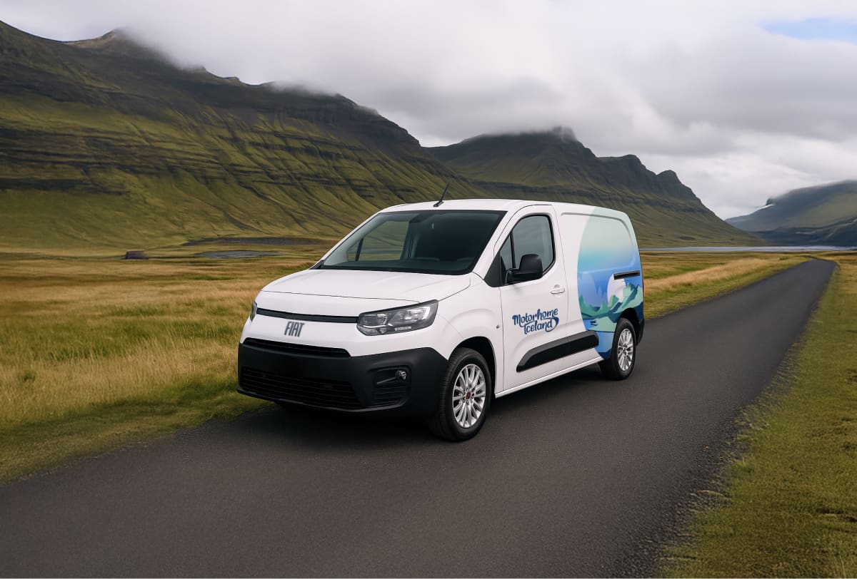 Fiat Dobló campervan on the Icelandic road on a foggy day