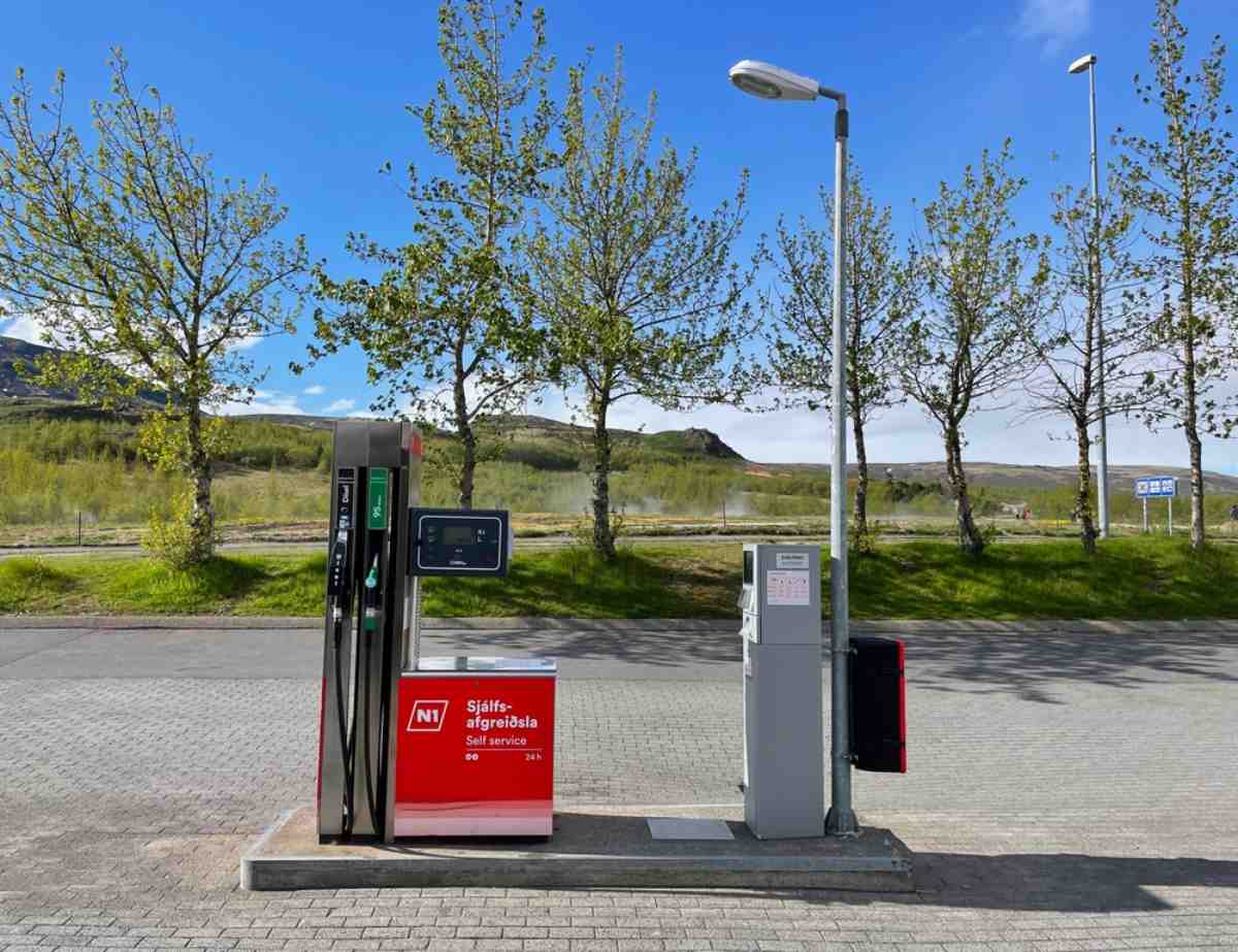 General view of a small automatic gas station in Iceland of the company N1 with two fuel pumps and a nearby meter to calculate the value of the amount