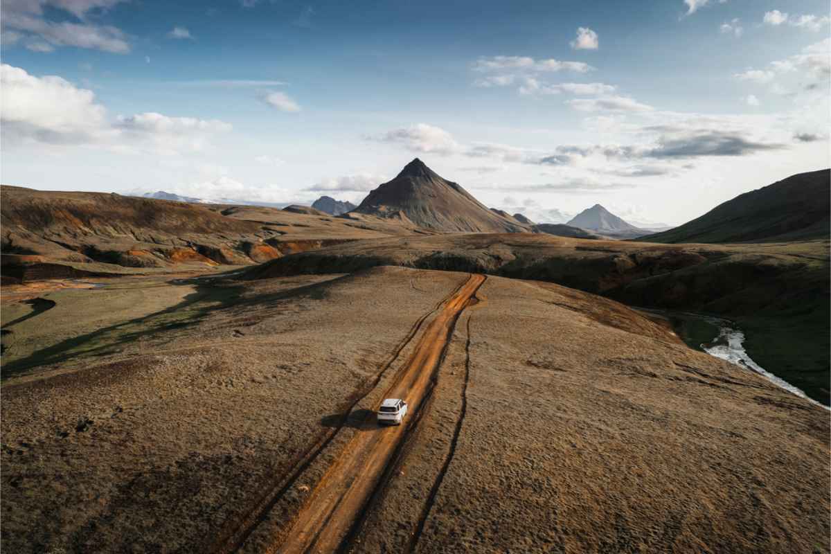 drone view of a gravel road in Iceland's impressive landscape